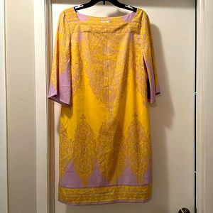 Beautiful silk like dress in yellow and lavender color , mid length sleeves.